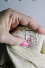 Women's or men's vintage 1970's Ched, Quality Knits label short sleeve cream colored Mariah band tee with brown butterfly graphic on the front.