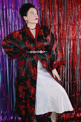 Women's or men's vintage 1990's NK label long sleeve long length black and red reversible robe smoking jacket in a thick silk material.