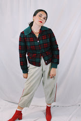 Women's vintage 1960's Pendleton label long sleeve plaid print wool cropped lightweight jacket in red and green colors. Fully lined, buttons up the front, and two front pockets.