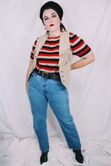 Women's vintage 1990's BB Dakota Leatherwear label light tan colored suede leather vest with fringe detail and silver buttons