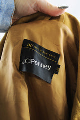 Men's or women's vintage tan colored long sleeve suede jacket by JCPenney. Popper buttons and contrast stitching and fully lined.