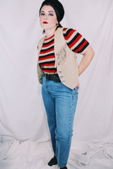 Women's vintage 1990's BB Dakota Leatherwear label light tan colored suede leather vest with fringe detail and silver buttons