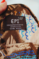 Men's vintage 1970's EPI, European Prime International label long sleeve lightweight polyester button up shirt in brown with all over multicolored abstract print.