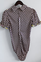 Women's vintage 1970's short sleeve puff sleeve bodysuit with collar in a black and purple checkered print and florals.