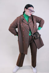 Women's vintage 1970's lightweight brown colored pea coat with a double breasted closure. Brown buttons and white contrast stitching