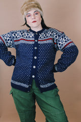 Women's or men's vintage 1970's Norway Handknitted label size large navy blue Norwegian style button up wool cardigan with all over white and red print