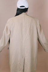 Men's or women's vintage 1960's Cashmere Deluxe Exclusively For Baskin label size large long sleeve long length tan camel colored cashmere coat with button closure.