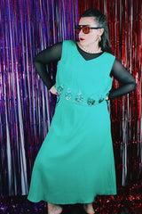 Women's vintage 1970's Saks Alley label sleeveless midi length kelly green polyester dress with sequin detail on chest.