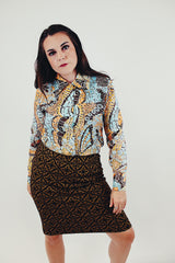 vintage long sleeve button up blouse with brown blue and orange print front