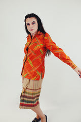 vintage bright orange long sleeve button up blouse with collar green, white, and light orange print side