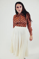 vintage printed long sleeve button up blouse with pointy collar in various brown tones front