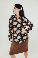 vintage long sleeve brown button up blouse with white and orange floral print front