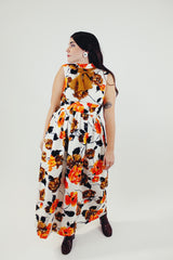 vintage sleeveless floral printed maxi dress with mock neck and neck tie orange white brown front