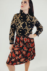 vintage long sleeve button up blouse with black and tan print and pointy collar front