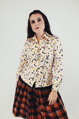 Long sleeve vintage button up blouse pointy collar brown yellow and prink print white base front