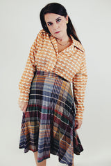 Vintage cream and orange floral printed long sleeve button up blouse front tucked in