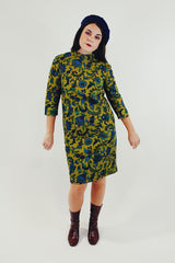Green and blue paisley printed midi dress with mock neck and 3/4 length sleeves front