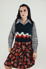 forest green vintage women's acrylic sweater vest with orange and white stripe detail front