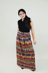 vintage slinky polyester sleeves dress with button up top in black and printed bottom skirt with matching belt front