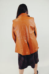 Vintage camel colored pleather jacket with four front pocket back