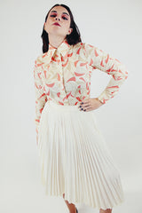 vintage long sleeve button up blouse cream collar with tan and orange pattern pointy collar front