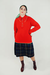 long red sweater with half buttons and collar