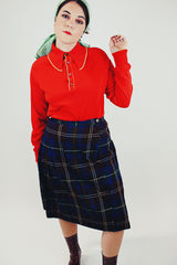 long red sweater with half buttons and collar