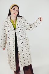 women's vintage white puffy pea coat with brown embroidered pineapple print front