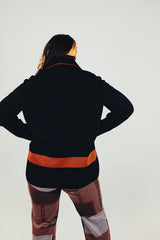 vintage women's polyester knit black cardigan with gold buttons and double lapel back