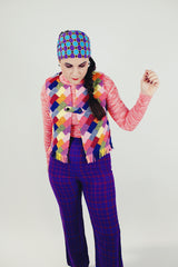 women's vintage multicolored vest with one button closure and fringed hem front