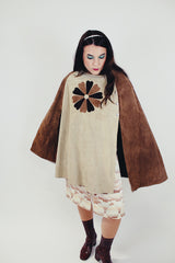 women's vintage two tone brown suede poncho with popper closure and suede flower on the front side