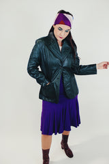 dark green women's vintage 1970's leather jacket, two button closure four front pockets