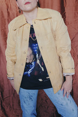 Women's or men's vintage 1970's Styled by Scully in Los Angeles long sleeve long length tan camel colored leather jacket with leather buttons up the front.