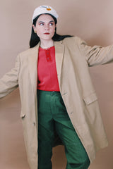 Men's or women's vintage 1960's Cashmere Deluxe Exclusively For Baskin label size large long sleeve long length tan camel colored cashmere coat with button closure.