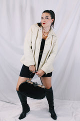 Women's vintage 1960's Custom Made Genuine Native Deerskin label long sleeve cream colored leather jacket. Fully lined, side pockets, and leather covered buttons.