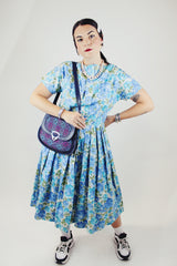 short sleeve blue floral print midi length dress with a line structure women's vintage 1960's