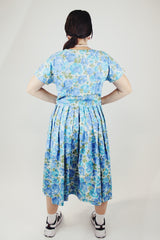 short sleeve blue floral print midi length dress with a line structure women's vintage 1960's