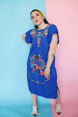 Women's vintage 1970's short sleeve bright blue cotton dress with all over multicolored floral and parrot print embroidery