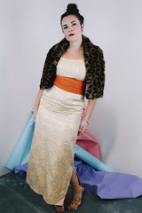 Women's vintage 1960's sleeveless ankle length dress in a cream off white with metallic gold floral print all over