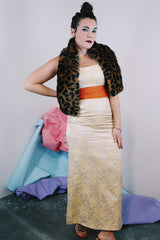 Women's vintage 1960's sleeveless ankle length dress in a cream off white with metallic gold floral print all over