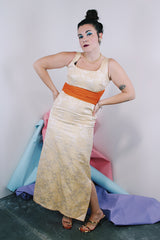 Women's vintage 1960's sleeveless ankle length dress in a cream off white with metallic gold floral print all over