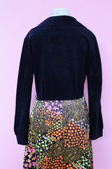 Women's vintage 1960's Lounging Apparel Evelyn Pearson label long sleeve maxi length twofer house dress with a black velvet top part and multicolored floral print skirt.