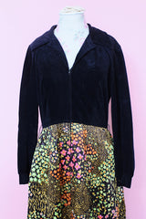 Women's vintage 1960's Lounging Apparel Evelyn Pearson label long sleeve maxi length twofer house dress with a black velvet top part and multicolored floral print skirt.