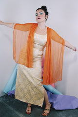 Women's vintage 1960's sleeveless ankle length dress in a cream off white with metallic gold floral print all over