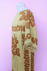 Women's vintage 1970's Fashion Manor, Decorator Collection label short sleeve ankle length dress in a mustard yellow and brown floral print cotton towel material.