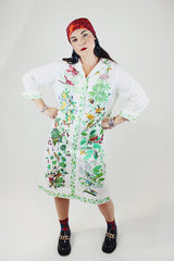 long sleeve mid length shirt dress in white with all over bird print polyester women's vintage 1960's