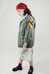 long sleeve green army jacket buttons up with two chest pockets vintage