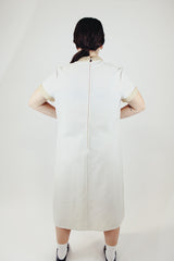 short sleeve white midi length dress with gold metallic dots and trim vintage 1970's