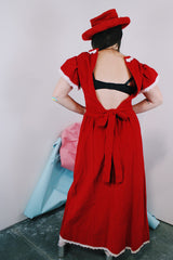 Women's vintage 1970's short sleeve flutter sleeve red velvet ankle length dress with white applique trim.