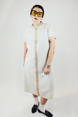 short sleeve white midi length dress with gold metallic dots and trim vintage 1970's